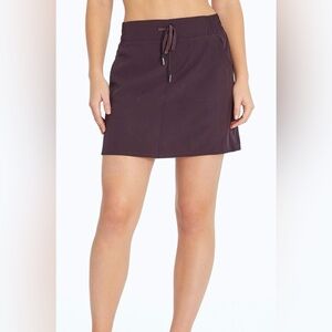 NWT Marika Athletic Skort, Builtin Shorts, Pockets, Wild Plum Color, Size Medium